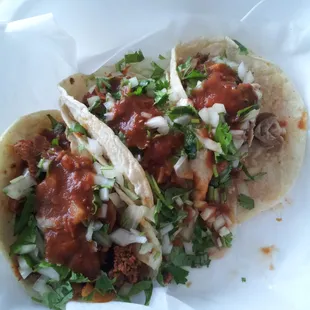 Tacos de al pastor y buche.