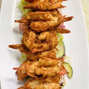 grilled shrimp on a white plate