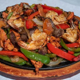Fajita Mixta
Steak,Chicken &amp; Shrimp