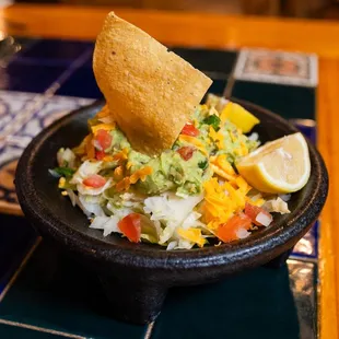 a tortilla and guacamole