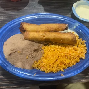 Chimichangas cheese sauce on side