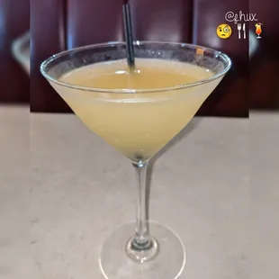 a cocktail in a martini glass