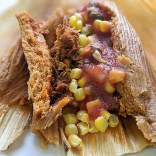 tamales, very small and dry, added the corn and salsa at home to make it softer.