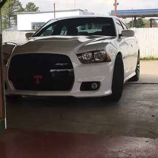 Outdoor parking under the roof.