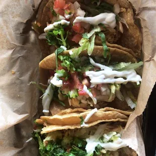 Shredded chicken street tacos from MexOut