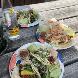 Pastor, lengua, chorizo and fish tacos. Steak and chicken in the back.