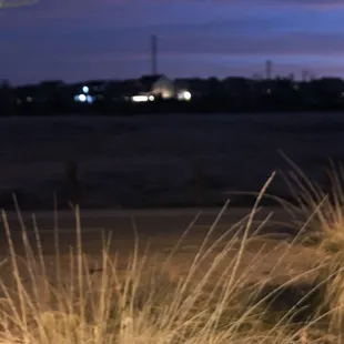 Neighborhood walking path next to the restaurant along the parking lot.