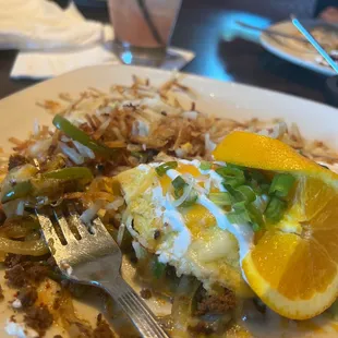 Best breakfast and drink,.pomegranate margarita and Mexican omelet..