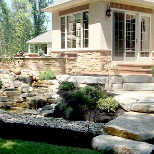 a garden with a waterfall