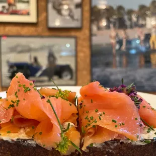 Smoked Salmon Toast with scallion cream cheese and duck trap lox with chives and dill.