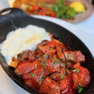 Yoğurtlu: Grilled Angus Sirloin & Meatballs served over flatbread, tomato sauce, yogurt, brown butter | $36