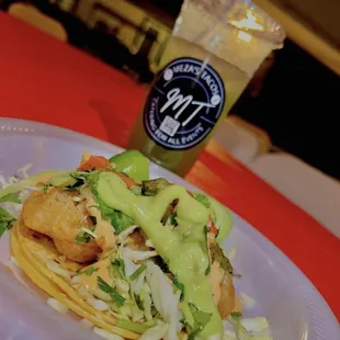 Shrimp tacos and cucumber drink