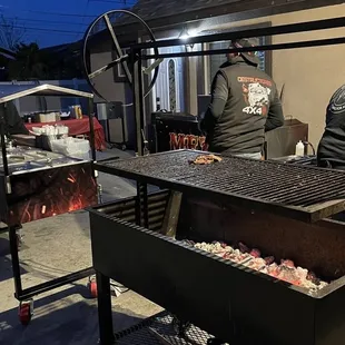 a group of people preparing food