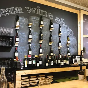 a wall of wine bottles