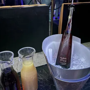 Bottle service with cranberry and pineapple juice