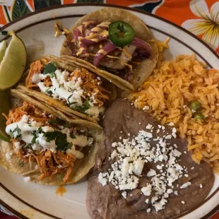 Chicken Tinga  Fish Taco Refined beans and rice