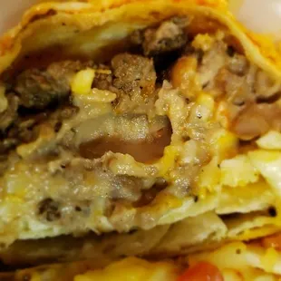 Inside the macho steak burrito, mostly steak and beans.