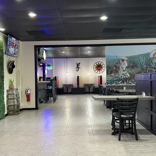 Looking left from our booth. Second room with a bar, tables and more booths. 12 booths on our side of the Mezcali mural wall.