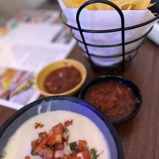 IG: @foodie__fe - Chorizo queso dip (paid). Chips &amp; salsa (free)