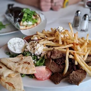 Lamb gyro platter and chicken gyro sandwich