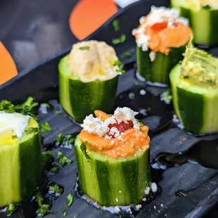 cold mezes on little cucumber pieces