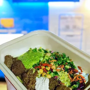 BYO Bowl by robots: Spiced Lamb &amp; Falafel w/ rice, slaw, Israeli salad, hummus, tzatziki, green goddess | $12.49