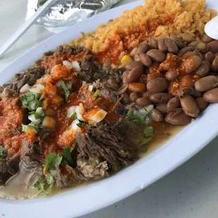 Didn't know what to order, first time here so I went with the barbacoa de chivo, plate comes with rice beans hand made tortillas.