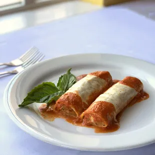 Manicotti Vegetale. Homemade pasta stuffed with ricotta cheese and mixed vegetables