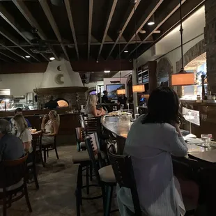 people sitting at a bar