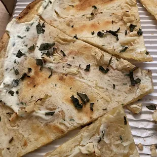 Mezzaluna cauliflower pizza with just ricotta cheese.