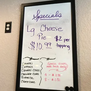 a menu on a white board