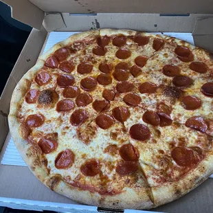 Delicious pizza!!! . Crust was perfectly cooked through with a nice crisp to it!   Warmed up nicely for a late night snack.