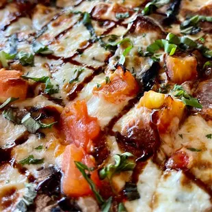 Specialty Pies: Portabello Mushroom with tomatoes, fresh mozzarella, fresh basil, and balsamic glaze. DELICIOUS!