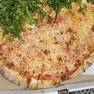 Layer of arugula on it :(  we order this eveey other week and it NEVER looks like this.