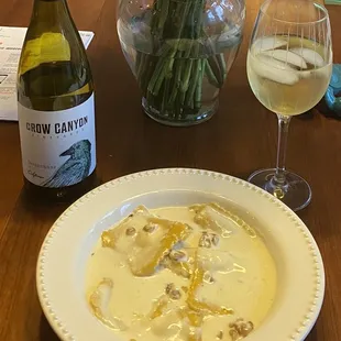 Quarantine comfort food - take out Pumpkin Ravioli and Chardonnay