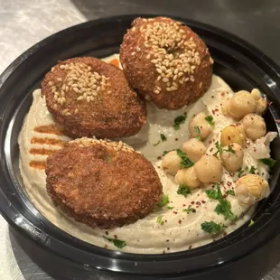 Hummus with falafel to go order.