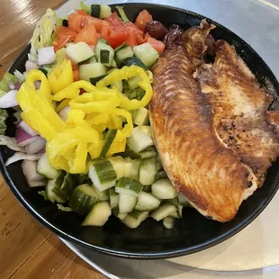 Rice bowl with house rice and tilapia.