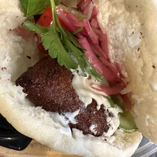 a pita with meat and vegetables