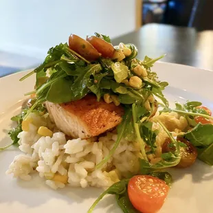 "Salmone- sweet corn risotto, heirloom cherry tomatoes, arugula, and saffron butter sauce."  Delicious!