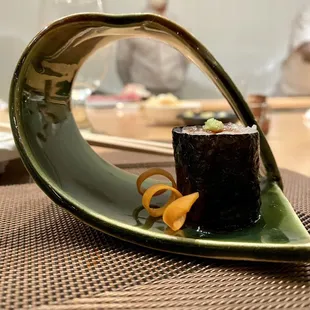 a plate with a sushi on it