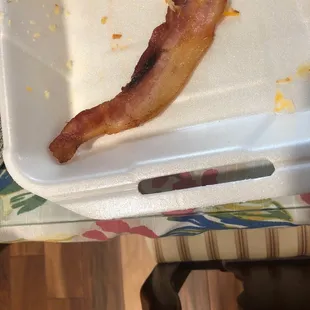 Raw uncooked bacon