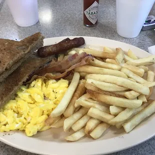 #1, 2 bacon, 2 sausages, scrambled eggs with fries instead of hash browns.