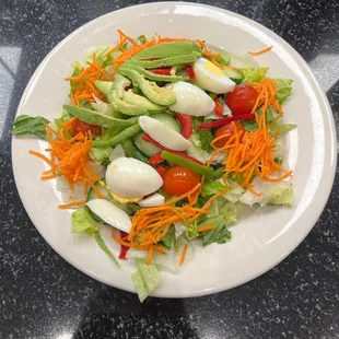 This is a Side Salad with egg &amp; avocado