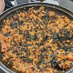 Mhat: save some sauce and chicken from Dak Galbi so they can mix up this rice for you at end