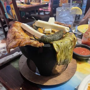 Mocajete Abuelito. Enough for two people and every meat you need for a week. Great Entrée