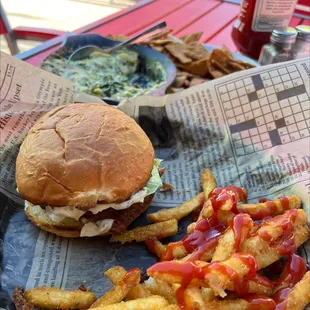 Cod sandwich and fries. Delicious spinach artichoke dip on the side. A great meal!!!