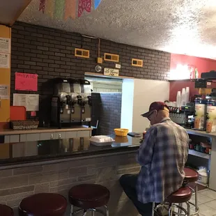 a man sitting at the bar