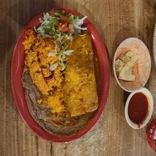 Shredded beef burrito served enchilada style