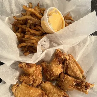 fried chicken wings and french fries