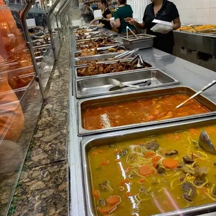a line of food being served